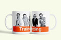 Trainspotting bögre fehér, narancs logóval, fehér kerámia, egyedi nyomtatott mintával